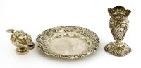 Lot 38 - A Continental white metal miniature Roman oil lamp