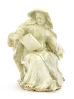 Lot 92 - A Bow white-glazed seated nun