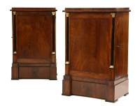Lot 970 - A pair of Biedermeier pedestal cabinets