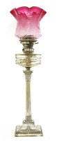 Lot 878 - A silver-mounted oil lamp