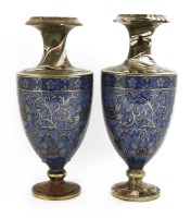 Lot 574 - A pair of pottery vases
