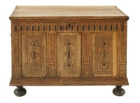 Lot 557 - An oak coffer