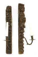 Lot 545 - A pair of oak wall brackets