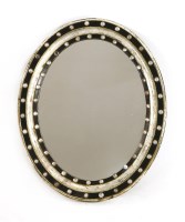 Lot 863 - An Irish Regency wall mirror