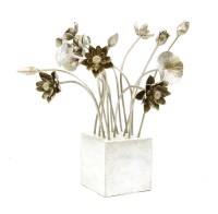 Lot 327 - A silver painted group of metal flowers of varying designs and heights