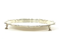 Lot 137 - A silver salver with shaped raised rim