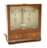 Lot 152 - A miniature brass box scales