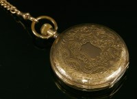 Lot 587 - A Swiss gold side wind Hunter pocket watch