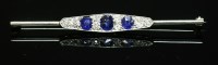 Lot 171 - An Art Deco white gold sapphire and diamond bar brooch