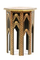 Lot 365 - An Indian style black lacquered and gilt highlighted octagonal occasional table