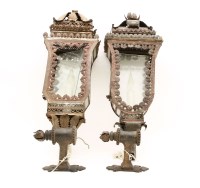 Lot 264 - A near pair of glazed pressed metal wall lights