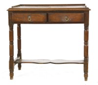 Lot 387 - An oak desk