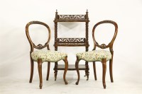 Lot 344 - A Victorian walnut three tier what-not
