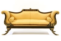Lot 891 - A Regency-style ebonised and parcel-gilt three-piece suite