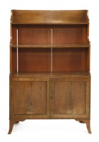 Lot 806 - A Sheraton mahogany and oak waterfall bookcase