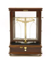 Lot 381A - A set of mahogany cased brass jewellery scales