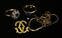 Lot 5 - A gold single stone synthetic sapphire ring