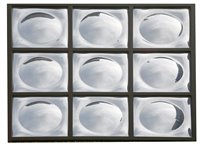 Lot 246 - An unusual contemporary wall mirror of nine segmented domed sections