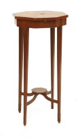 Lot 389 - An Edwardian satinwood occasional table