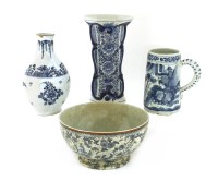 Lot 566 - A delft blue and white bottle vase