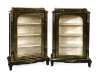 Lot 961 - A pair of boullework ebony and brass inlaid display cabinets
