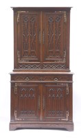 Lot 897 - A French Gothic oak cabinet