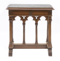 Lot 1012 - A walnut centre table