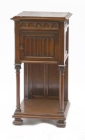 Lot 971 - A Gothic walnut pot cupboard