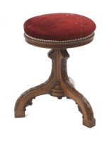 Lot 991 - An adjustable piano stool
