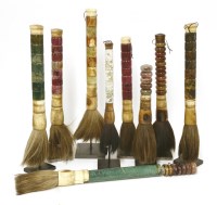 Lot 102 - A collection of hardstone-handled calligraphy brushes