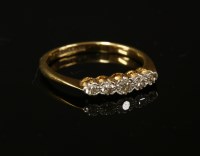 Lot 6 - A gold five stone diamond ring