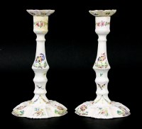 Lot 156 - A pair of Bilston enamel candlesticks