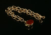 Lot 16 - A 9ct gold curb link Albert