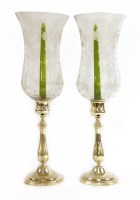 Lot 956 - A pair of Christofle and Co. silver-plated hurricane lamps