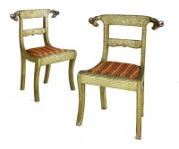 Lot 737 - A pair of Indian white metal clad side chairs
