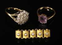 Lot 50 - A Victorian split pearl five stone panelled brooch