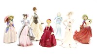 Lot 335 - Seven porcelain figures: two Royal Doulton