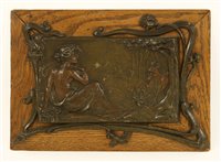 Lot 12 - An Art Nouveau patinated spelter panel