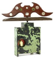 Lot 242 - A French carved wooden and mirror inset battery powered lark lure
