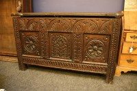 Lot 695 - A 17th century oak three panelled coffer