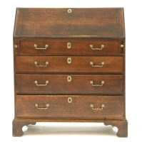 Lot 712 - A George III oak fall front bureau