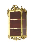 Lot 636 - A 19th century giltwood hanging display cabinet