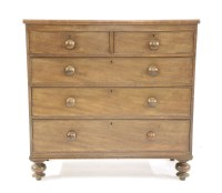 Lot 677 - A 19th century mahogany chest of two short above three long drawers
