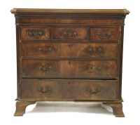 Lot 637 - A George III mahogany chest of three frieze drawers above two short drawers
