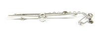 Lot 6 - A white gold single stone diamond bar brooch