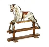 Lot 606 - A dapple grey rocking horse