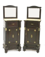 Lot 664 - A pair of Empire style bedside cupboards