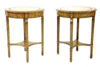 Lot 589 - A pair of George III style leather clad and brass inlaid two tier circular side tables