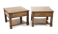 Lot 668 - A pair of modern single drawer crossbanded walnut bedside tables
