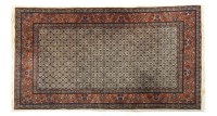 Lot 683 - Two ivory ground machine made Persian style rugs